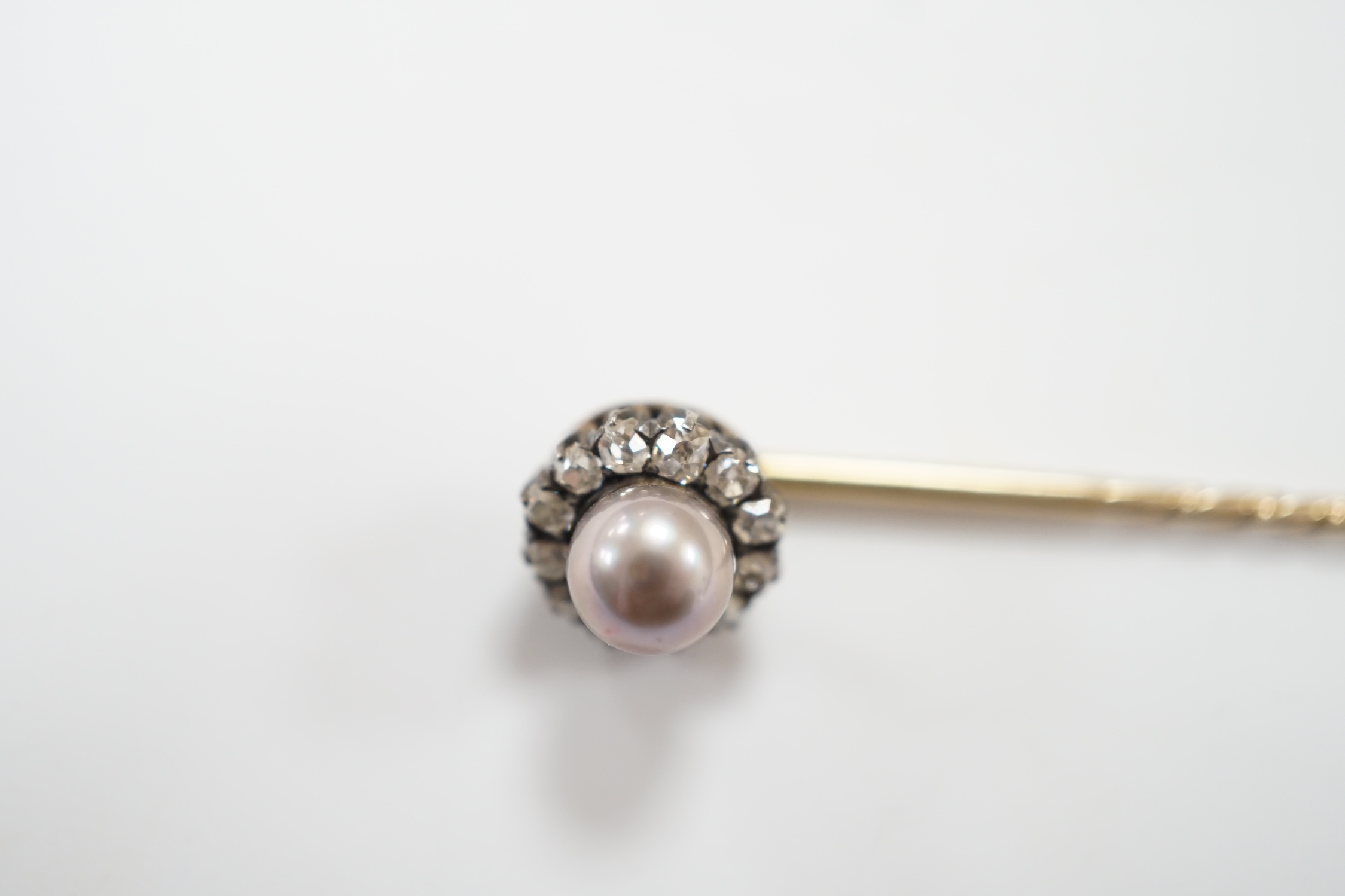 An early 20th century yellow metal, cultured pearl and old cut diamond cluster set stick pin, - Image 3 of 5