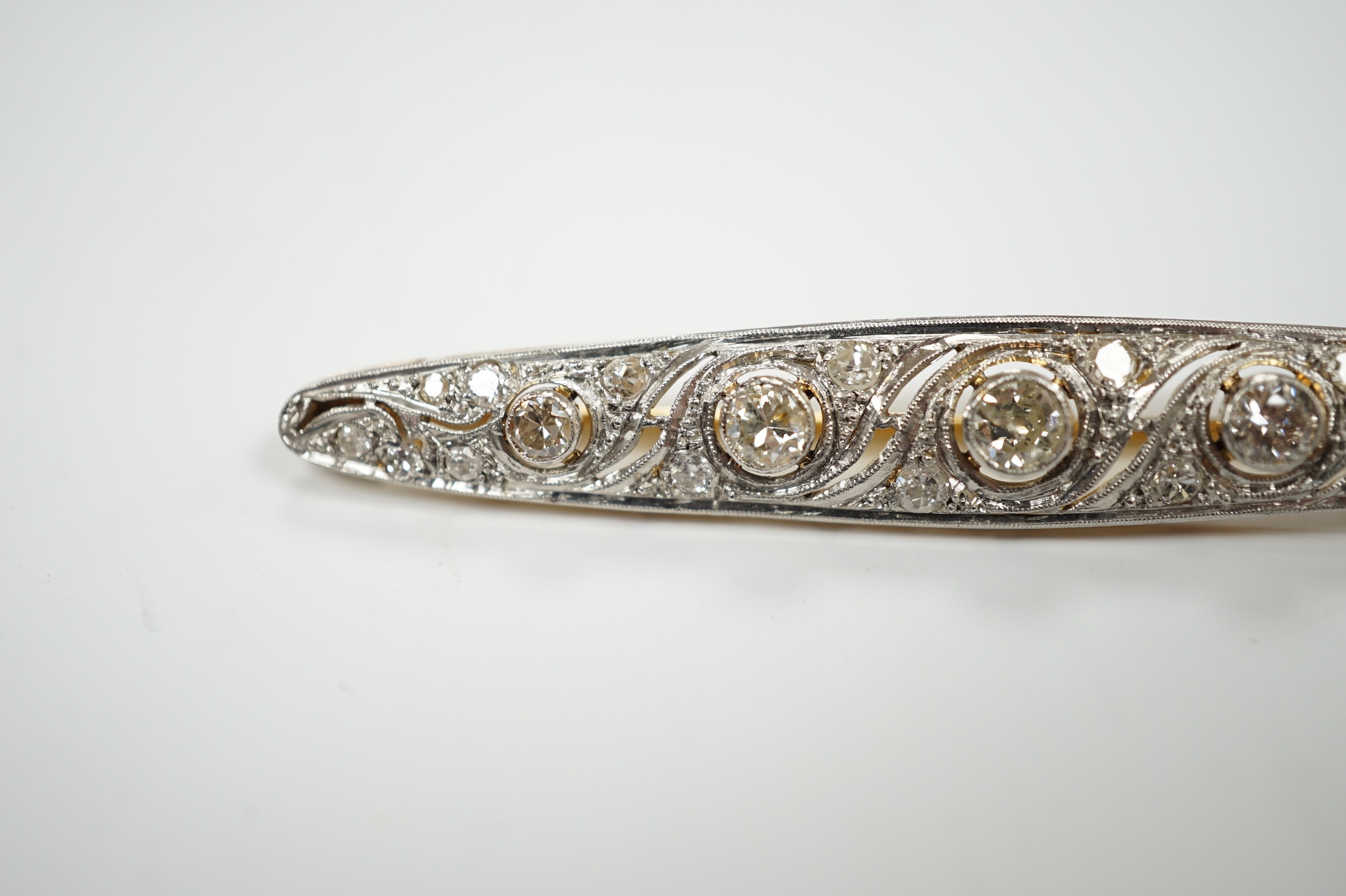 A Belle Epoque pierced white and yellow metal, diamond cluster set navette shaped bar brooch, - Image 2 of 4