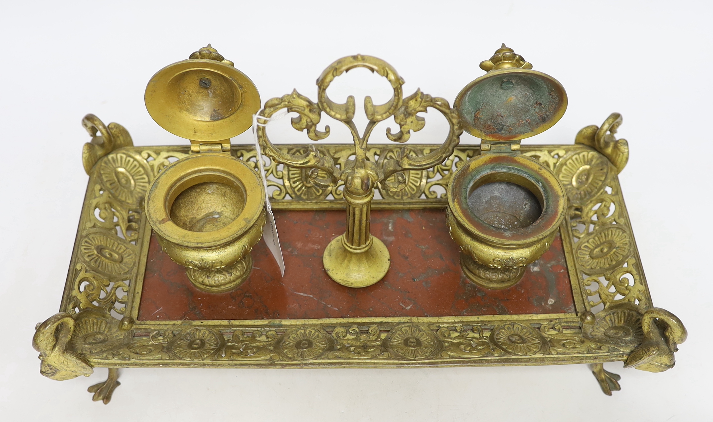 An ormolu inkstand with rouge marble base raised on four feet in the form of swans, 36cm wide - Image 3 of 3