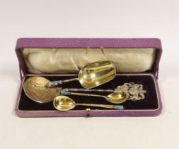 A late 19th century Russian 84 zolotnik and polychrome cloisonné enamel shovel shaped spoon, assay