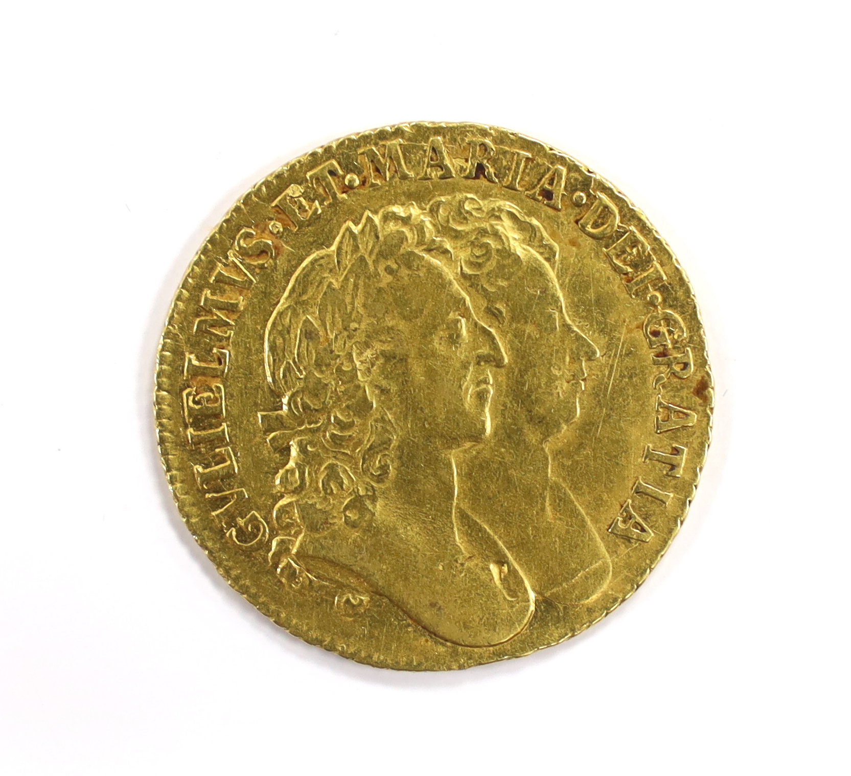 British gold coins - A William and Mary gold guinea, 1689, probably demounted at 12 o’clock, - Image 3 of 4