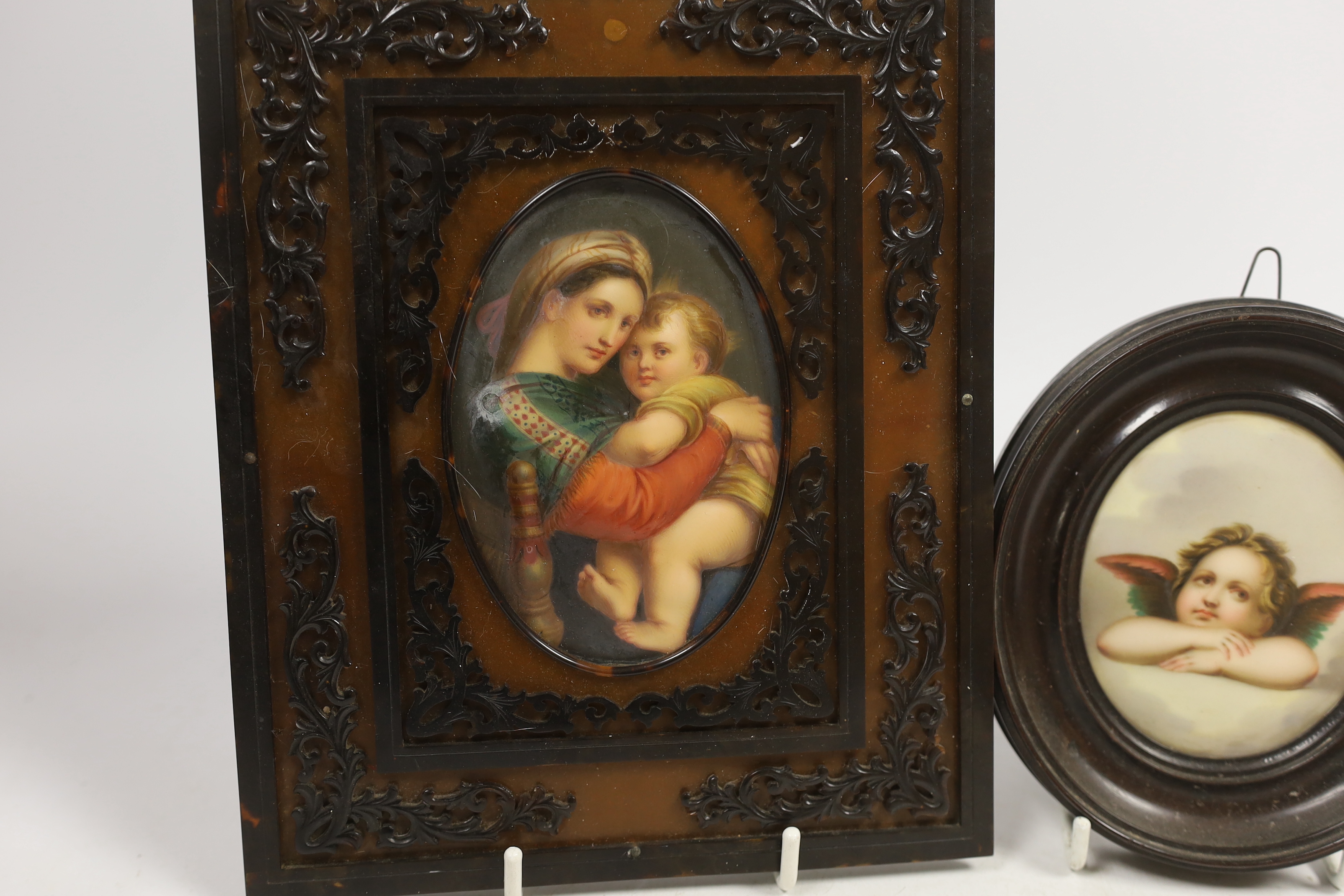 An oval porcelain plaque of mother and child in an ornate frame and a smaller circular porcelain - Image 2 of 4
