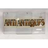 A pair of reverse painted glass 'antique' signs, 28 x 38cm