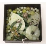 A group of assorted jade jewellery including bracelet, necklaces etc.