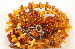 Assorted amber jewellery including necklaces, pendant, etc.