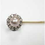 An early 20th century yellow metal, cultured pearl and old cut diamond cluster set stick pin,