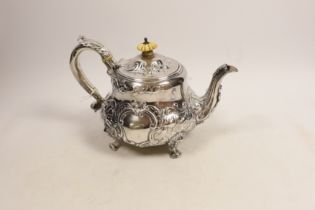 An early Victorian embossed silver teapot, Robert Hennell III, London, 1843, gross weight 22.2oz.