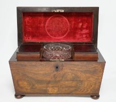 A Victorian rosewood sarcophagus shaped tea caddy with original cut glass mixing bowl, 33cm wide