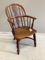 A 19th century yew and elm child's Windsor elbow chair, stamped 'Prior', width 38cm, depth 30cm,