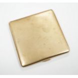 A George V square engine turned 9ct gold cigarette case by S. Blanckensee & Sons Ltd., Birmingham,