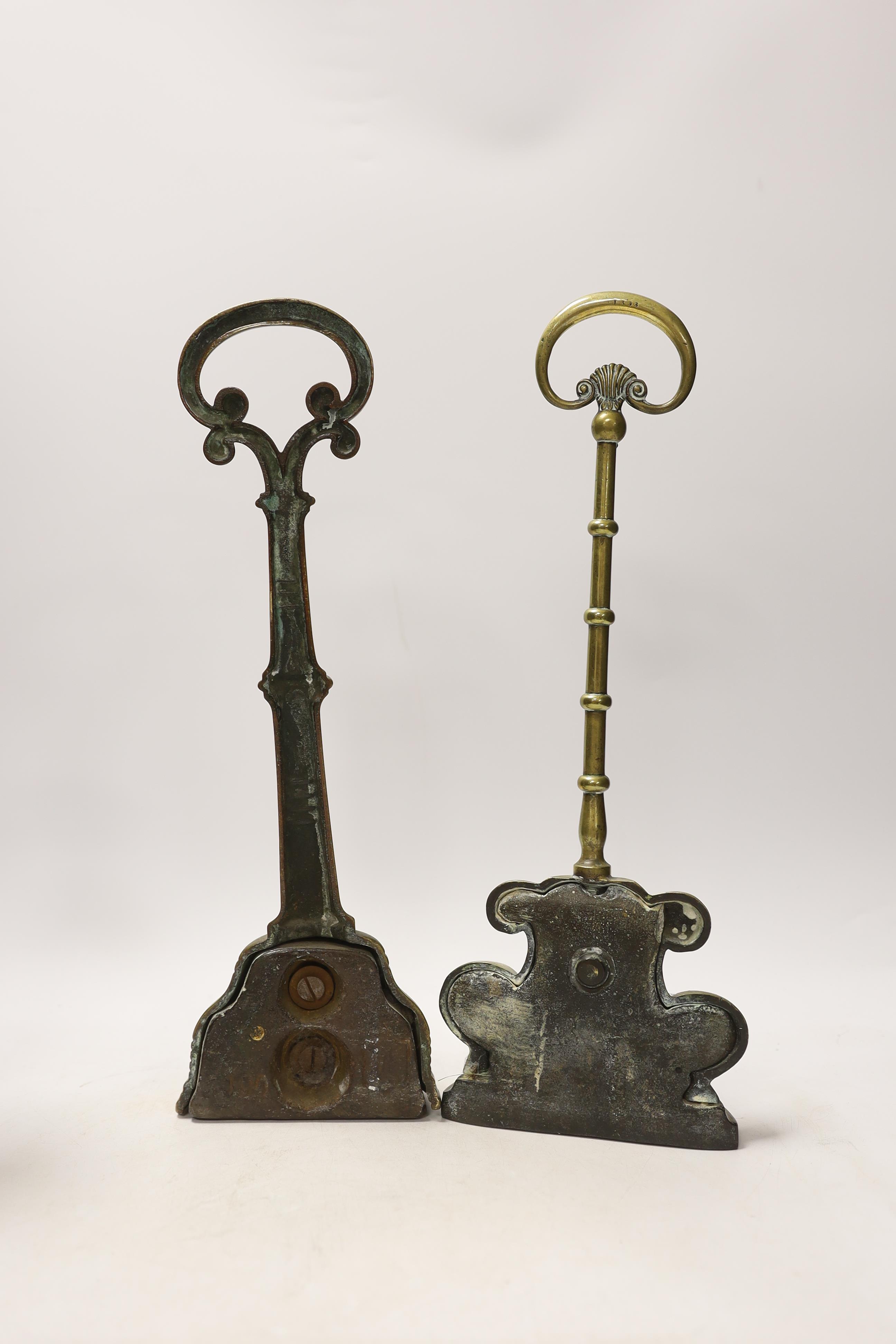 Two 19th century brass door porters and a pair of Gothic Revival brass candlesticks, 37cm (4) - Image 3 of 3