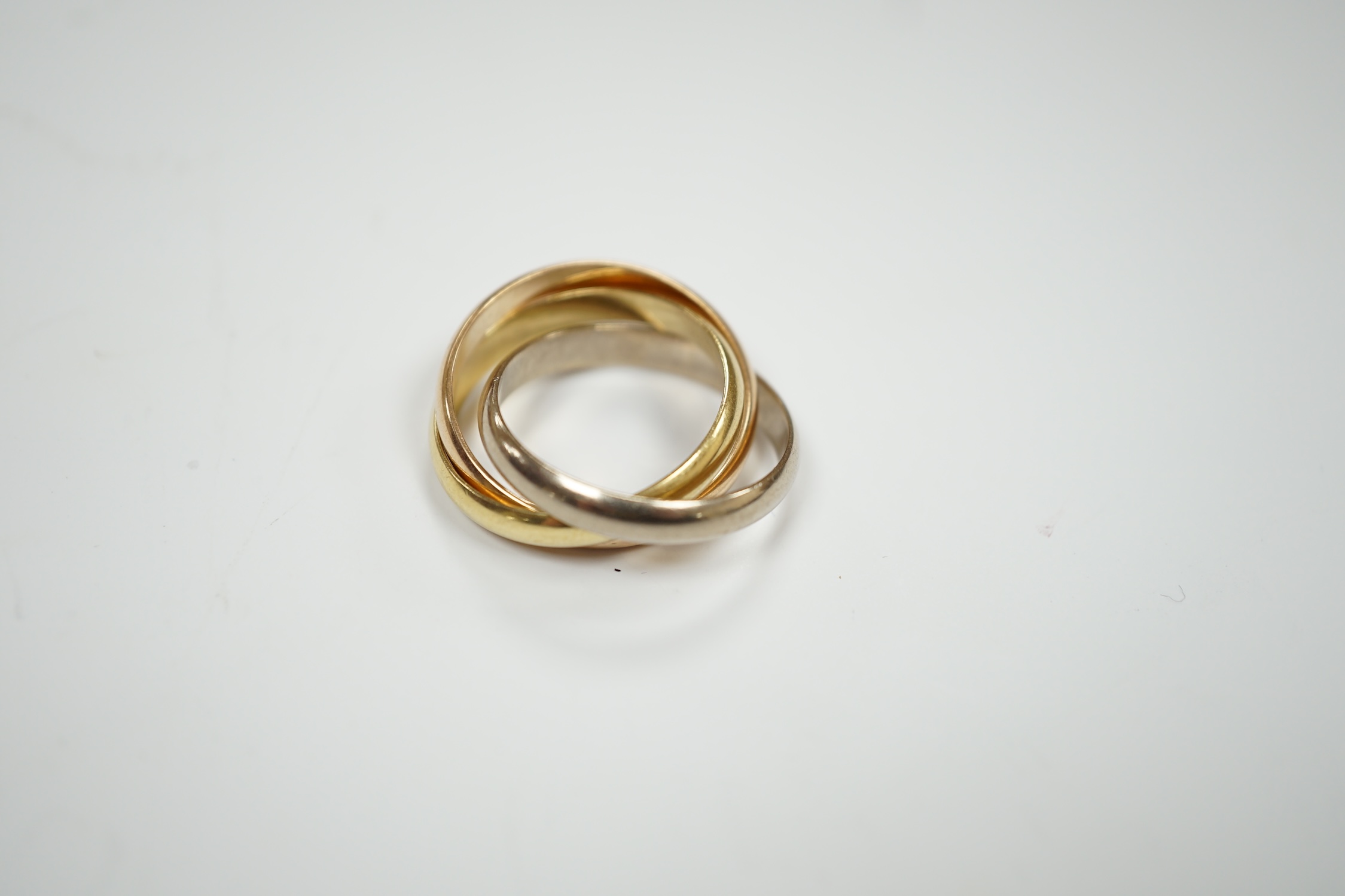A modern Cartier three colour 750 Russian wedding ring, signed and numbered GW3090, size P, 9.7 - Image 2 of 5