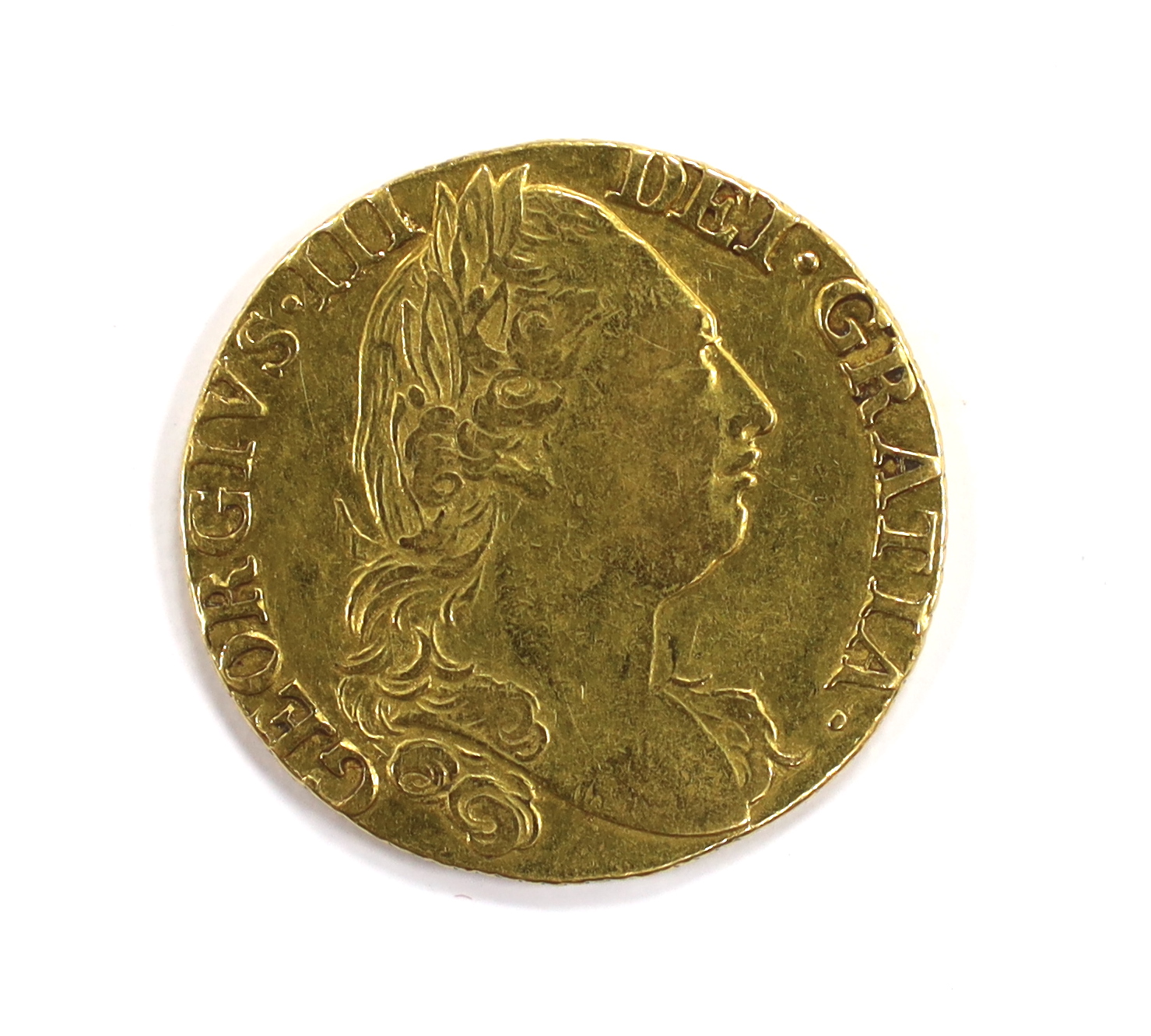 British gold coins - A George III gold guinea, 1779, fourth head, VF, (S3728)Provenance - bought - Image 2 of 3
