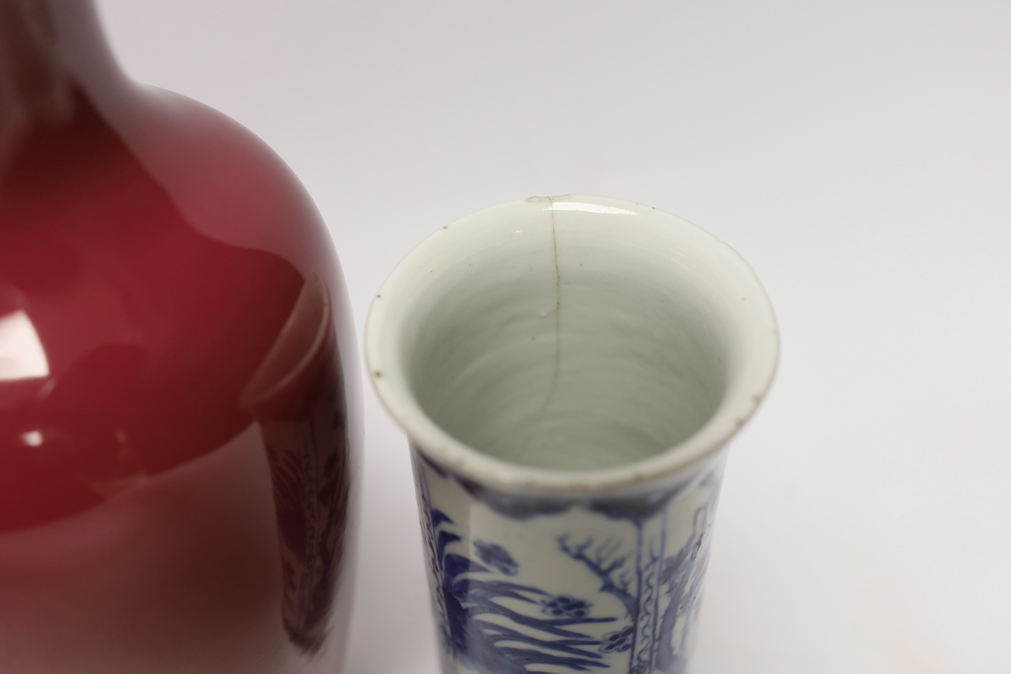 An early 20th century Chinese blue and white cylindrical vase, a ruby ground vase and an enamelled - Image 4 of 5