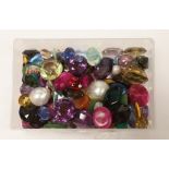 A quantity of assorted mainly unmounted cut and cabochon gemstones.