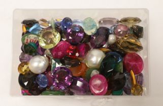 A quantity of assorted mainly unmounted cut and cabochon gemstones.