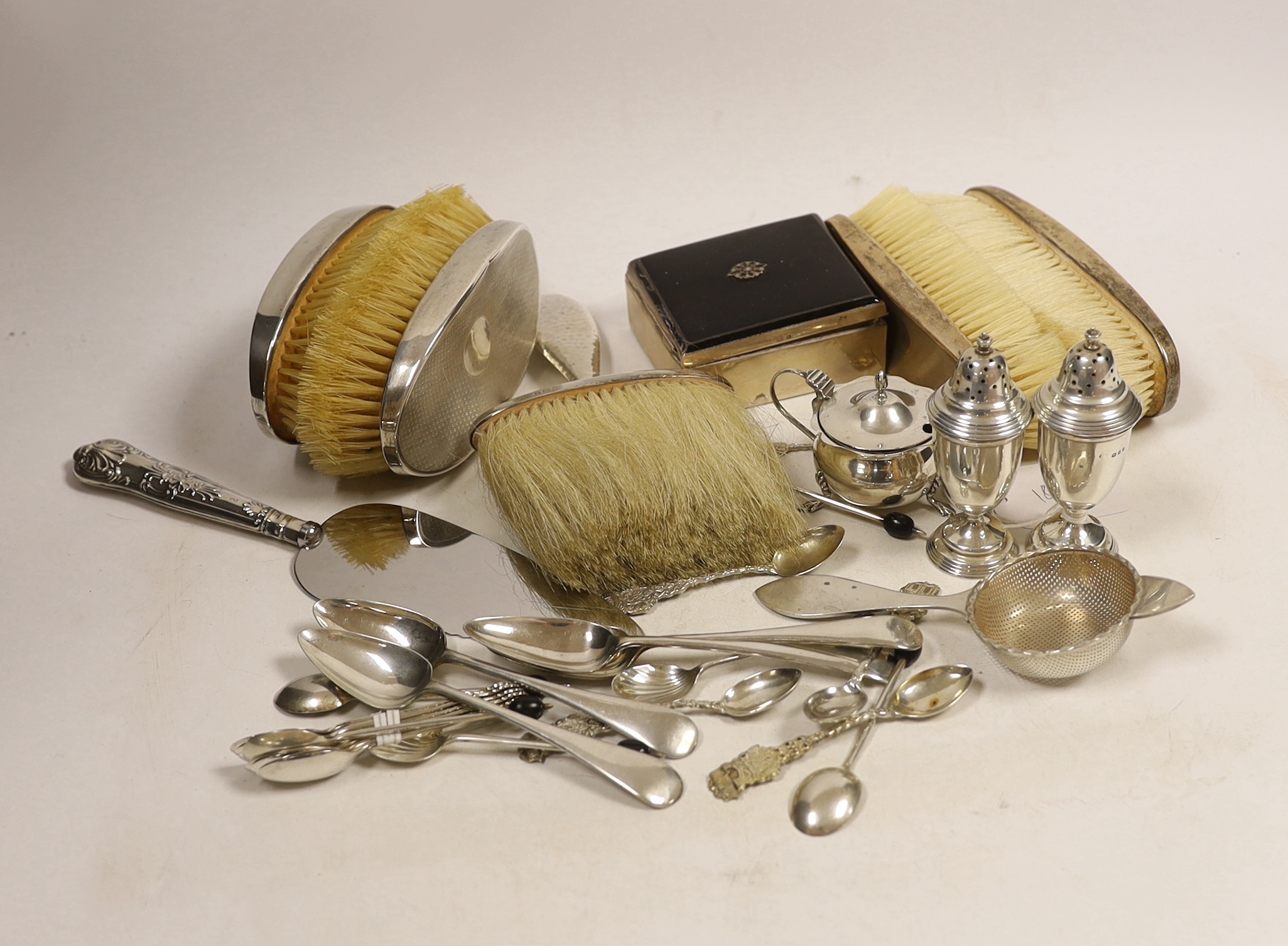 Sundry small silver including flatware, mounted clothes brushes, condiments and mounted cigarette