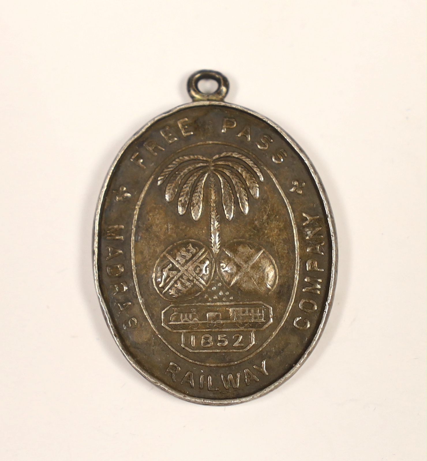 A scarce ‘Madras Railway Company free pass’ medallion, dated 1852, engraved ‘No125 ASST. TRAFFIC