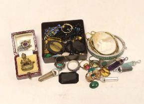 A small group of assorted costume jewellery including fob seal, pendants, rings, etc.