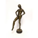 After Daniel-Joseph Bacqué (1874-1947), a bronze figure of an Art Deco woman, raised on circular