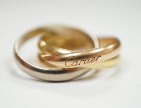 A modern Cartier three colour 750 Russian wedding ring, signed and numbered GW3090, size P, 9.7