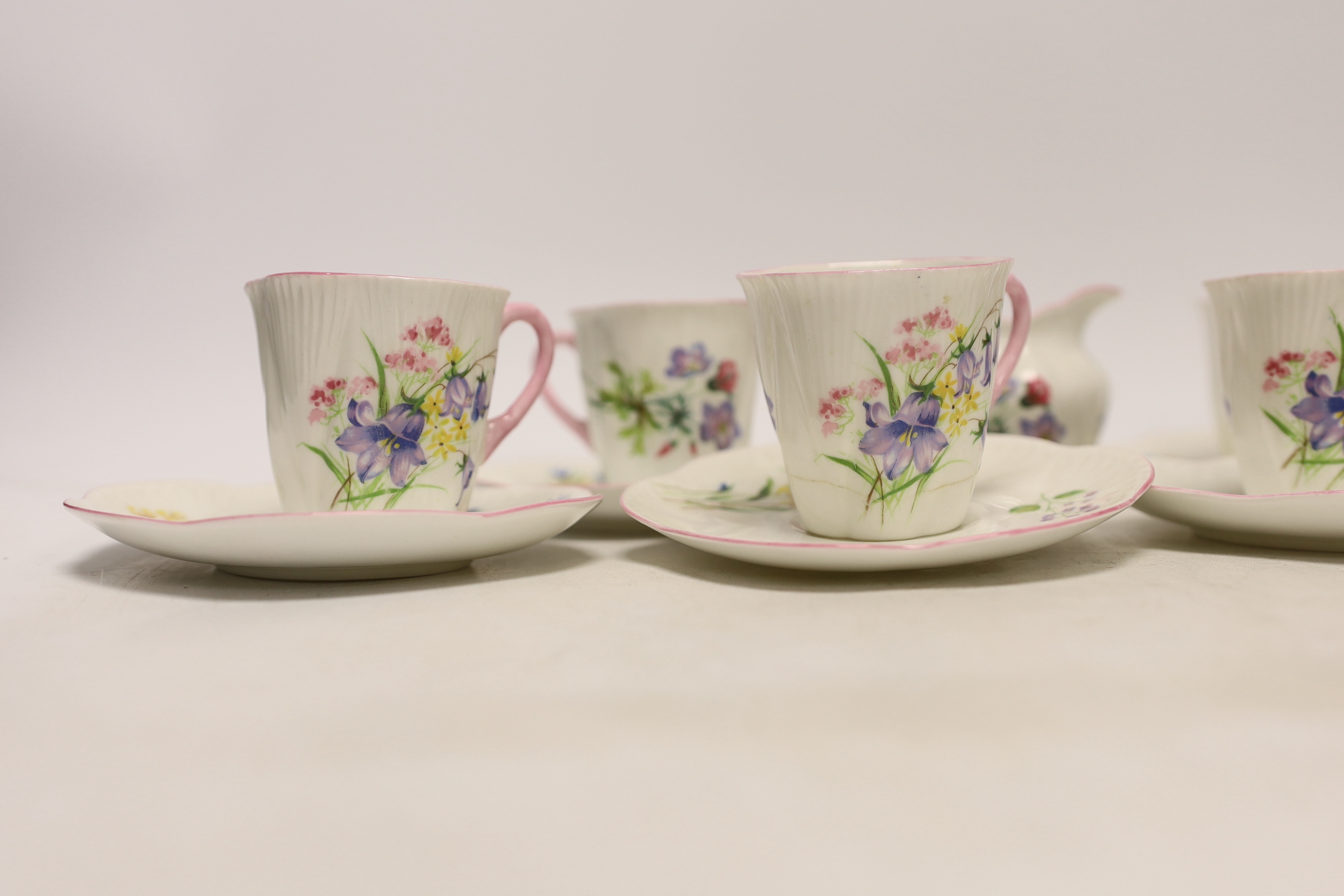 A Shelley 'wild flowers' bone china part tea set comprising milk jug and six cups and saucers - Image 2 of 5