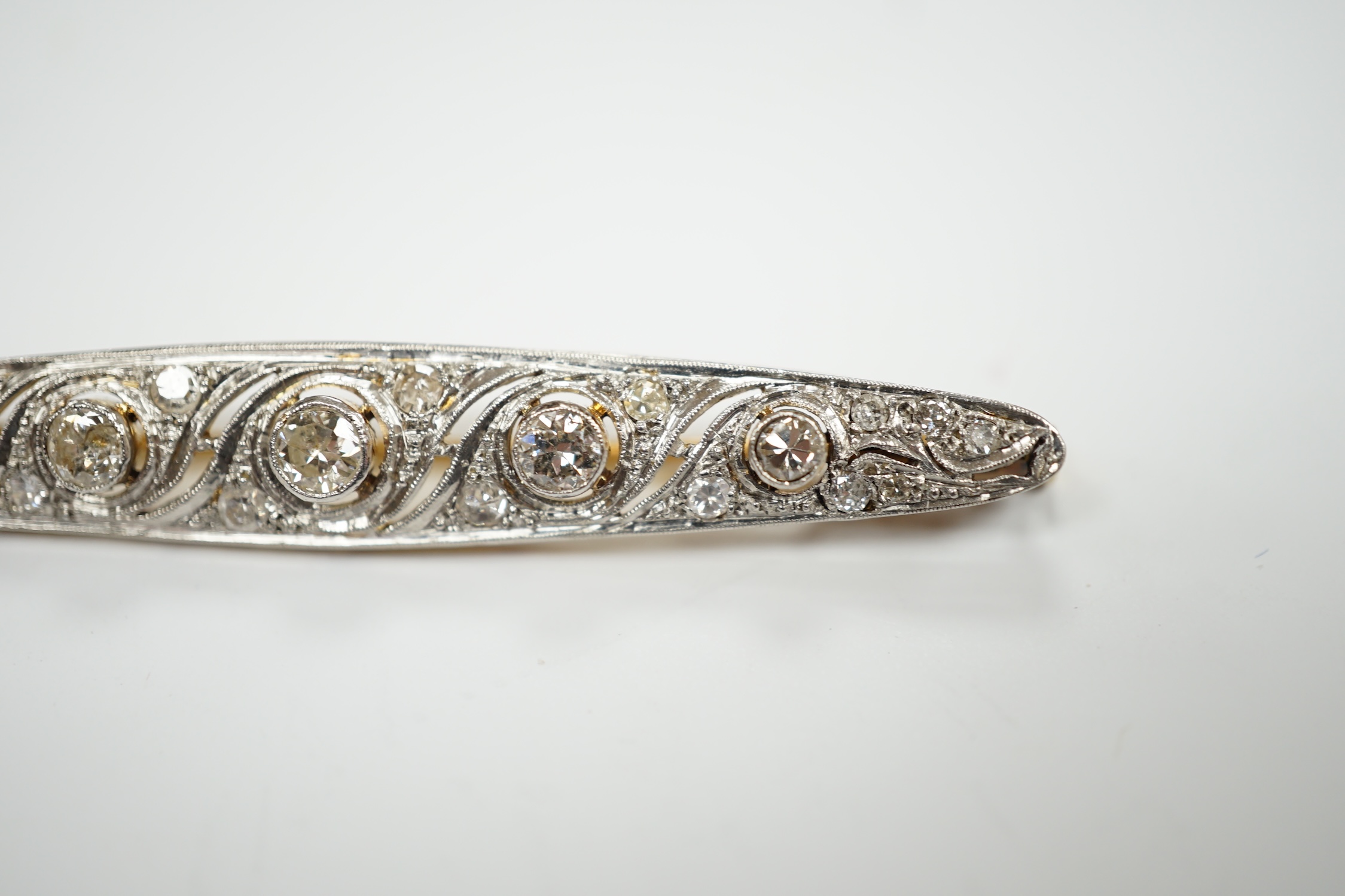 A Belle Epoque pierced white and yellow metal, diamond cluster set navette shaped bar brooch, - Image 3 of 4
