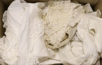 A small collection of early 20th century linen, crochet edge mats, cloths, a petticoat, Bertha, lace