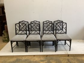 A set of eight reproduction ebonised faux bamboo dining chairs