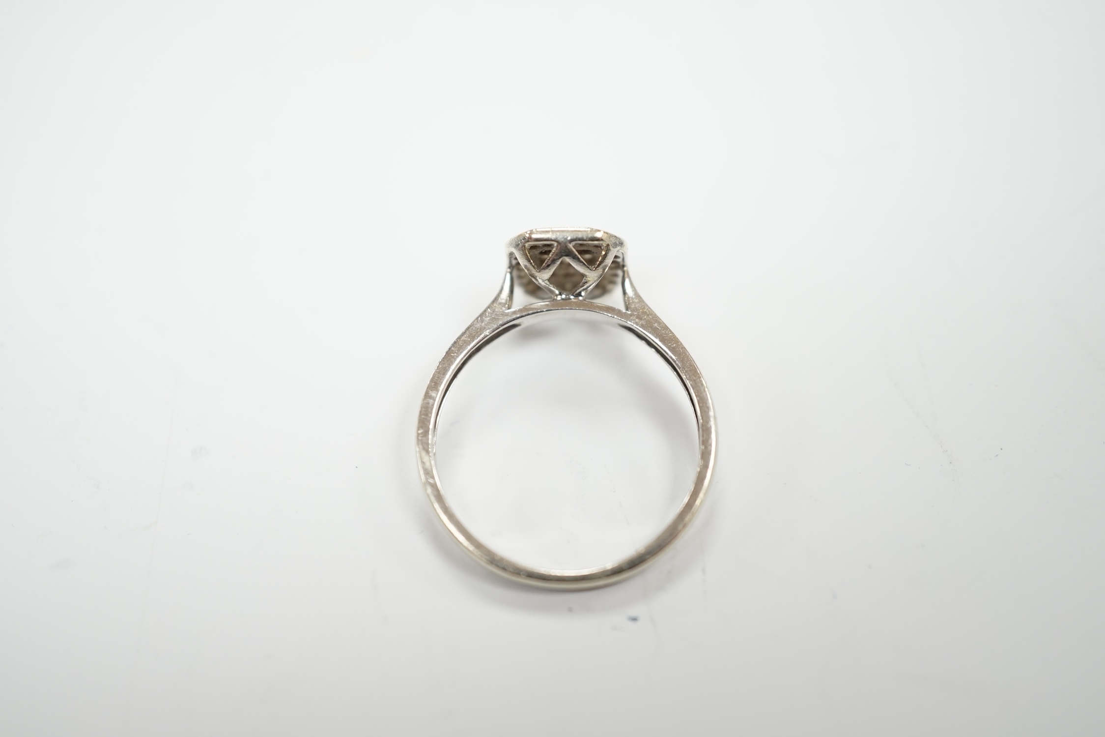 A modern 9ct white gold and diamond set cluster ring, size N, gross weight 2.5 grams. - Image 4 of 4