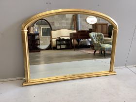 A Victorian style gilt composition overmantel mirror, width 124cm, height 85cm