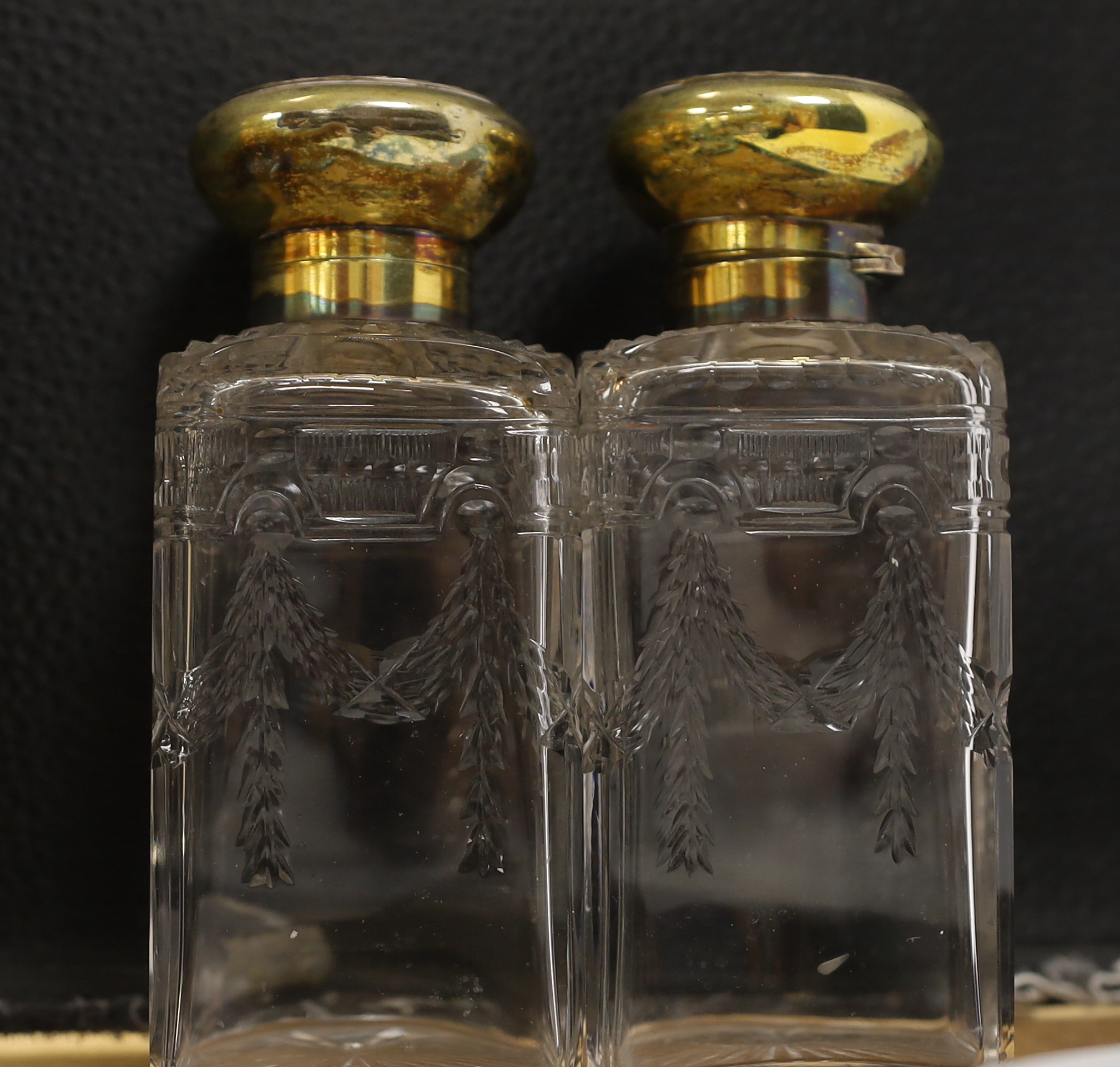 A pair of George V silver gilt mounted cut and etched glass square scent bottles and stoppers, - Image 4 of 4