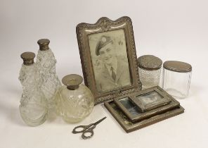 Four assorted early 20th century silver mounted photograph frames, largest 19.5cm (a.f.) five
