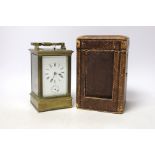 A cased early 20th century brass repeating carriage clock with alarm, 15.5cm