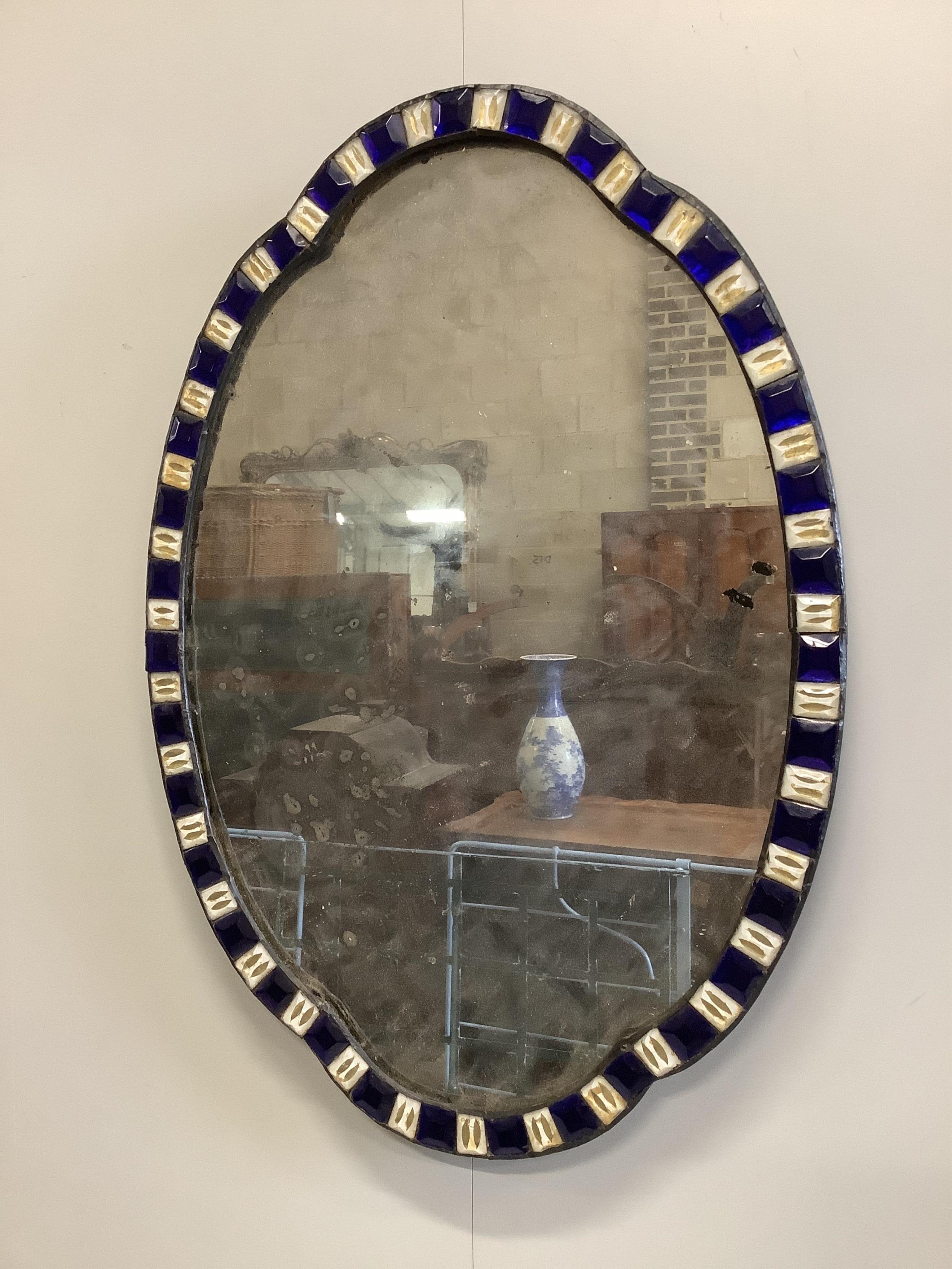 An Irish style oval wall mirror, width 49cm, height 70cm