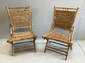 A pair of bamboo and woven seagrass folding chairs, width 59cm, depth 54cm, height 98cm