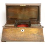 A Victorian rosewood sarcophagus shaped tea caddy with mother of pearl escutcheon, 33.5cm wide