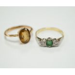 A 750, single stone emerald and two stone illusion set diamond ring and a 9ct and citrine set ring.