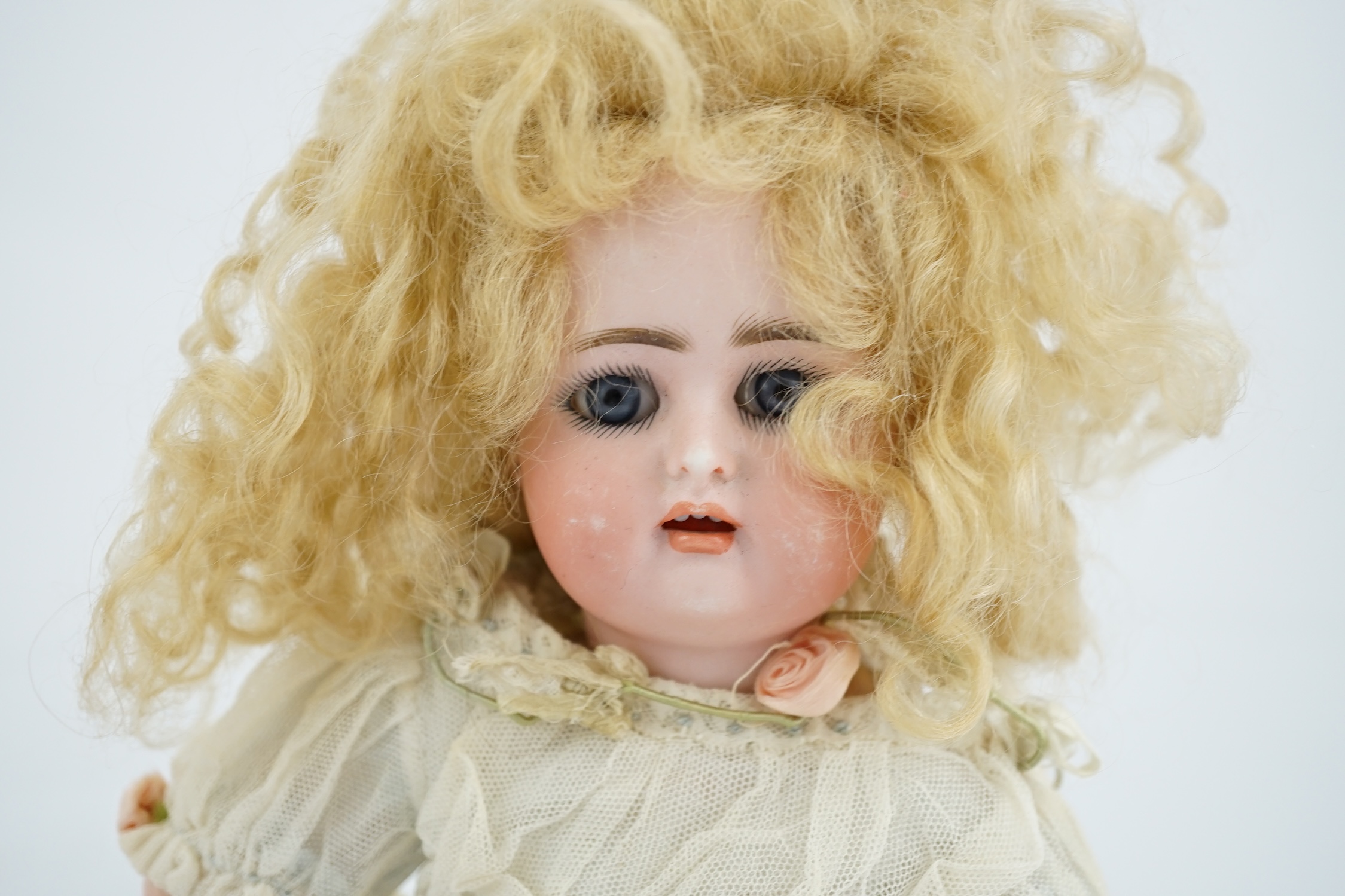 A Kammer & Reinhart / S & H bisque head doll, pierced ears, vintage clothes, one finger missing, - Image 2 of 5