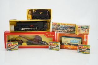 A collection of mostly Tri-ang Railways 00 gauge model railway, including three locomotives; a BR