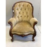 A Victorian walnut upholstered spoonback armchair, width 75cm, depth 80cm, height 94cm