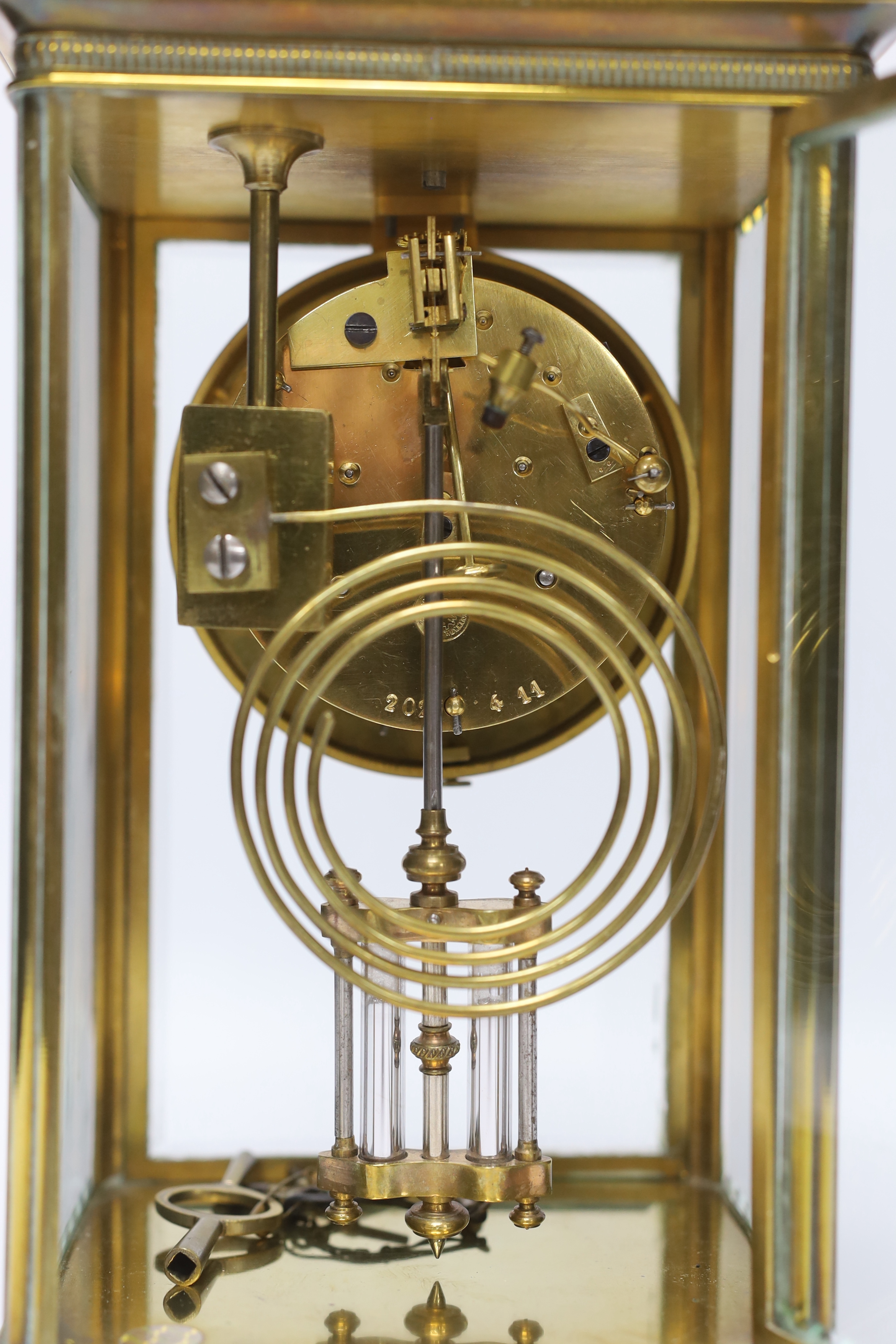 A late 19th century four glass brass clock with key and pendulum, 27cm - Image 3 of 3