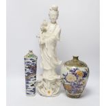 A 19th century Chinese blanc de chine figure of Guanyin, 20th century ‘dragon’ vase and a Japanese