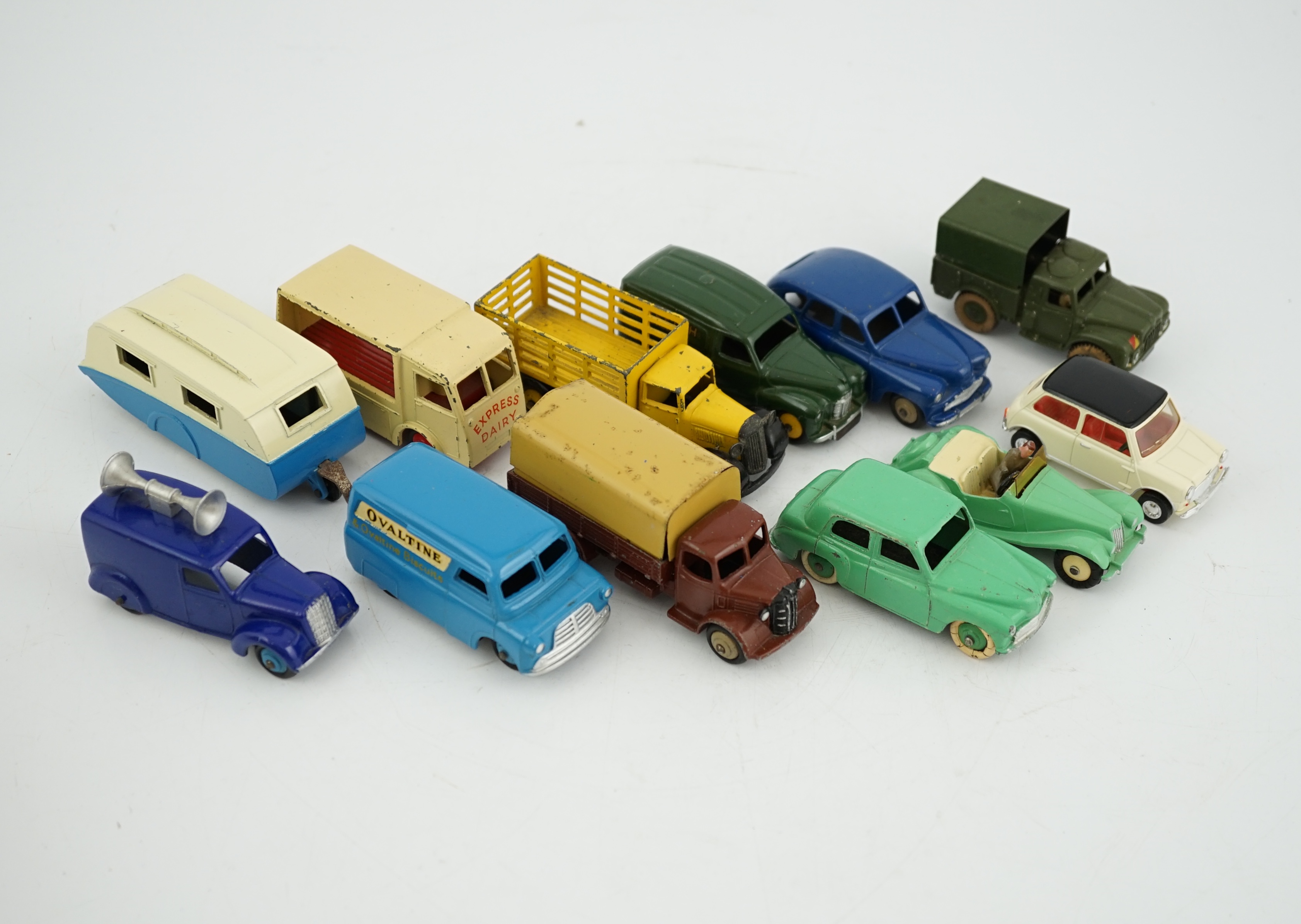 Twelve Dinky Toys, including; Austin van, Vanguard, Market Gardener’s wagon, Hillman Minx, MG