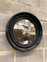 A circular convex wall mirror, diameter 51cm (a.f.)