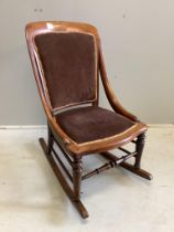 A Victorian mahogany rocking chair, width 49cm, depth 50cm, height 85cm