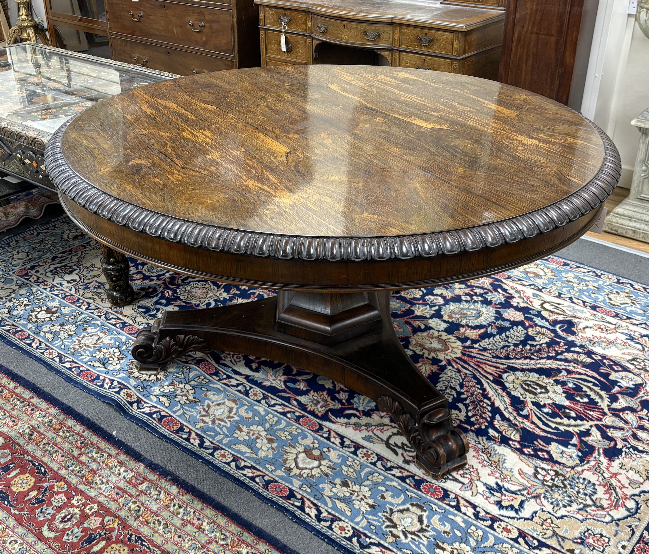 A William IV circular rosewood centre table, the tilt top with lappet carved edge on single - Image 4 of 5