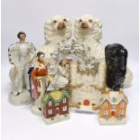 A mixed collection of Staffordshire figure groups to include various spaniels, Prince Albert figure,