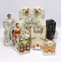 A mixed collection of Staffordshire figure groups to include various spaniels, Prince Albert figure,