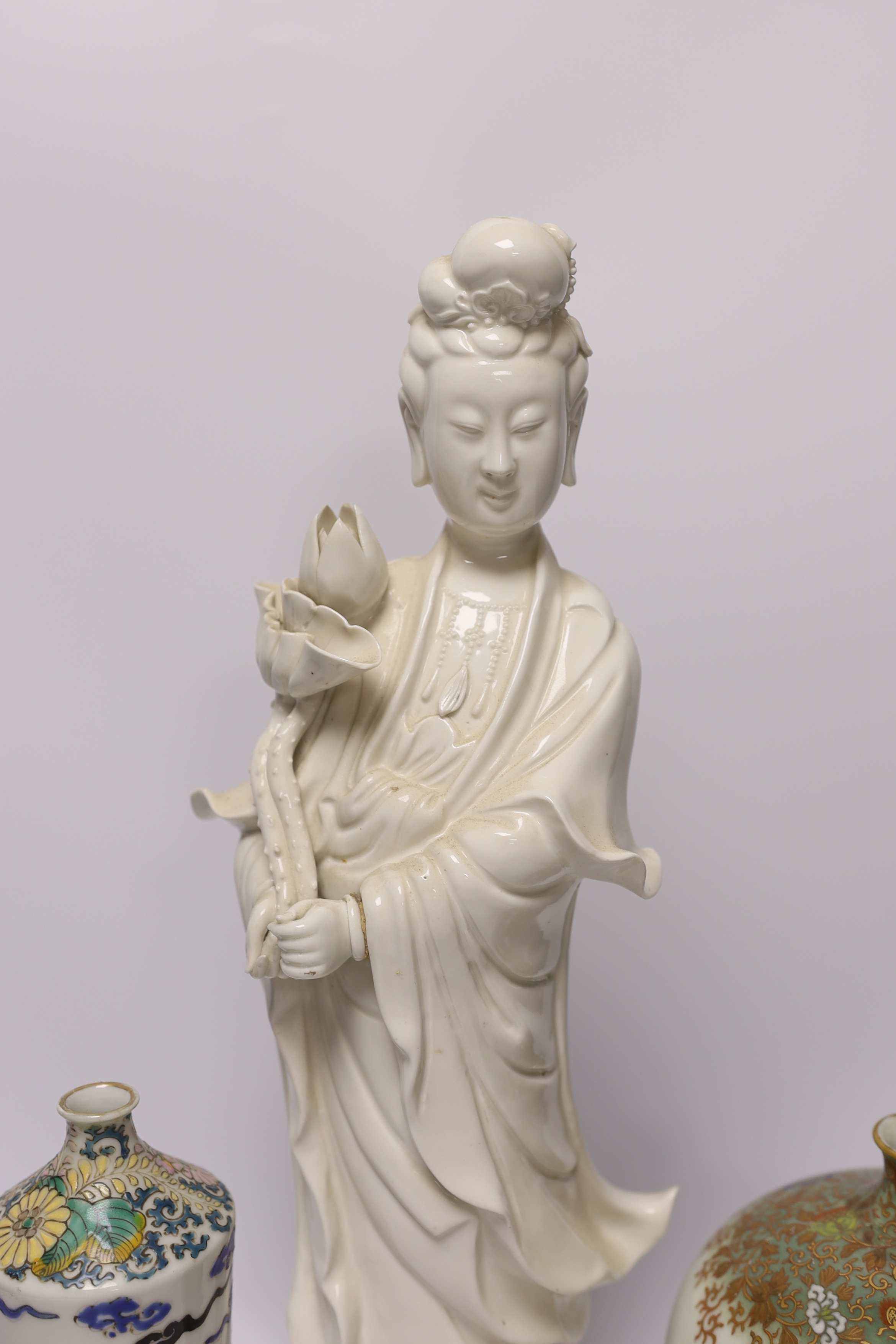 A 19th century Chinese blanc de chine figure of Guanyin, 20th century ‘dragon’ vase and a Japanese - Image 3 of 7